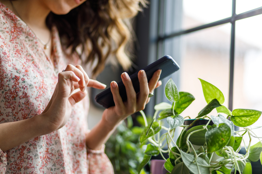 A person scrolls on their phone